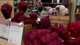 St. Louis Park yarn shop using red hats for protest