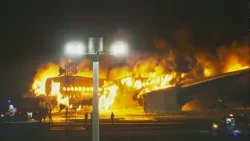 Planes collide and catch fire at busy Japan airport, killing 5