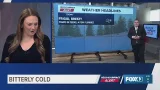 Jackie reacts to the bitter cold temps