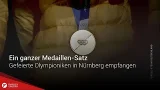 Ein ganzer Medaillen-Satz: Gefeierte Olympioniken in Nürnberg empfangen