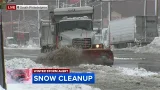 Snow plows work to clear roads in South Philadelphia