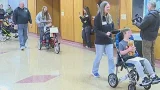 Charity donates mobility equipment to children with disabilities