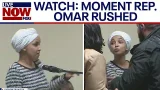 WATCH MOMENT: Ilhan Omar rushed and "sprayed"  [GRAPHIC]