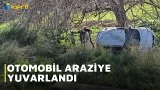 OTOMOBİL ARAZİYE YUVARLANDI