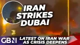 IRAN BREAKING: Watch Dubai US Consulate ERUPT into flames after drone strike as tourists flee IRAN BREAKING: Watch Dubai US Consulate ERUPT into flames after drone strike as tourists flee